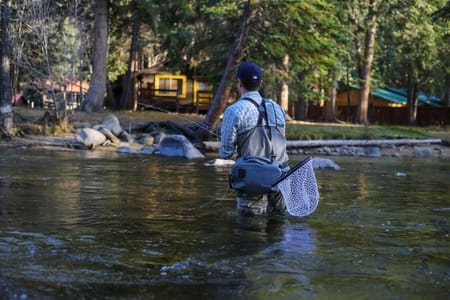 man fishing for trouts with a rod man-fishing-for-trouts-with-a-rod
